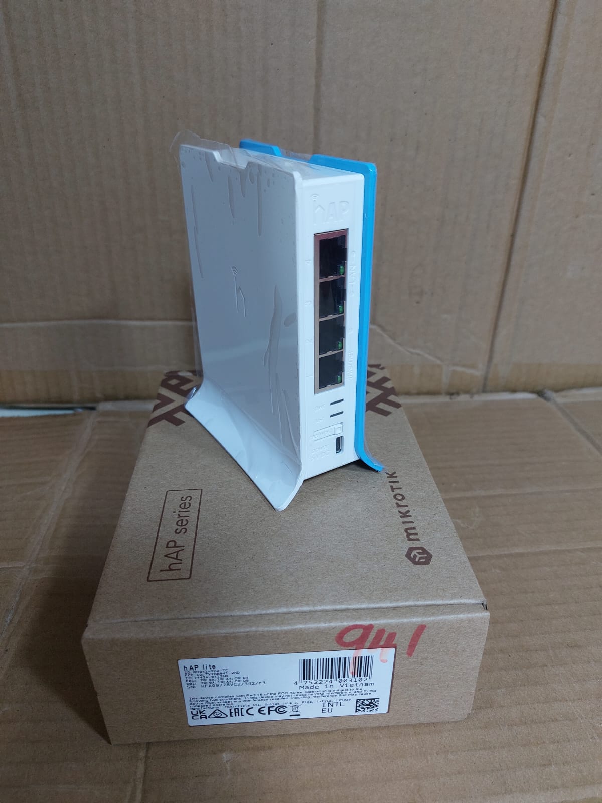 Front view of MikroTik hAP lite entry-level wireless router
