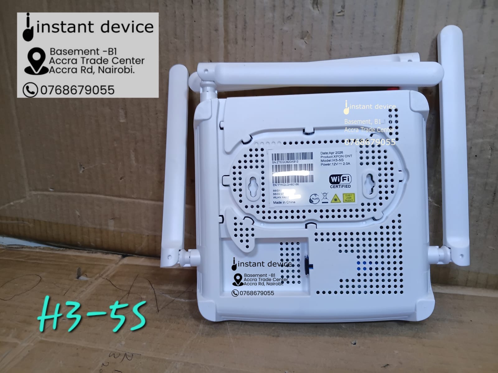 Bottom view of H3-5S Dual Band XPON ONT showing model information and wall mounting slots